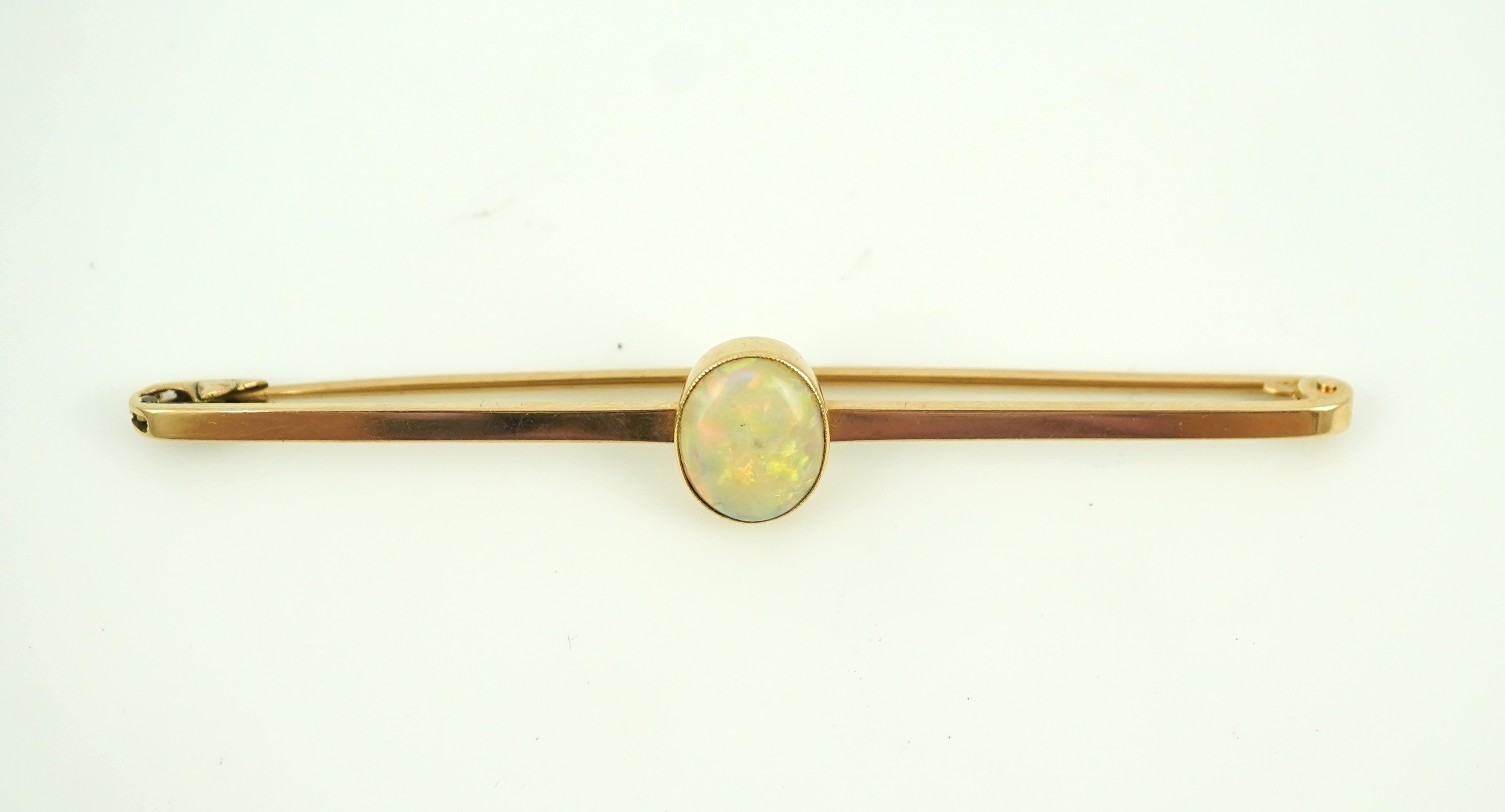 An Edwardian gold and opal brooch, early 20th century